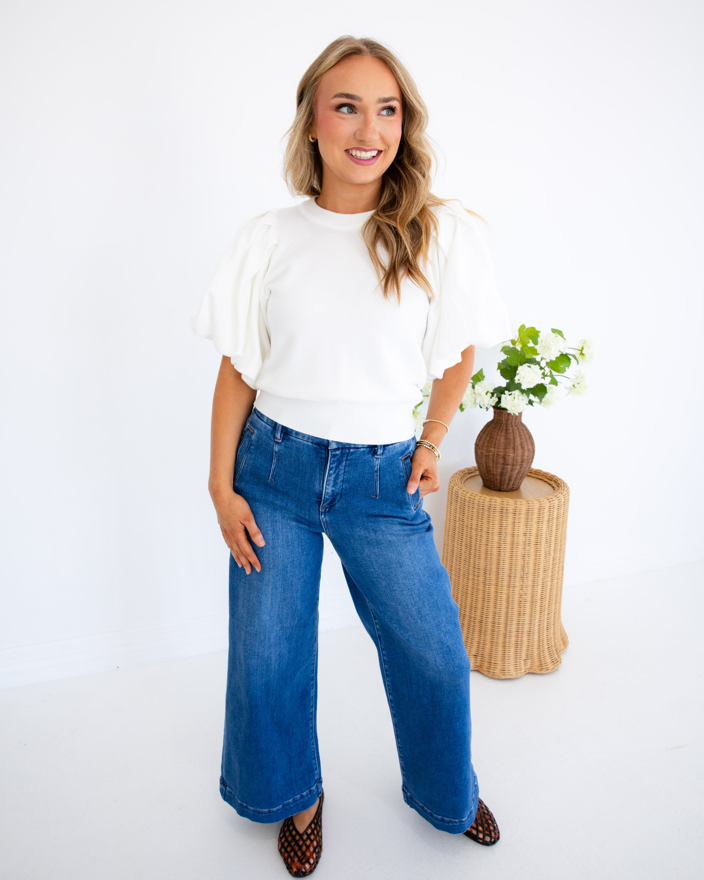 Risen | The Cali Flare Cropped Denim Jeans in Dark