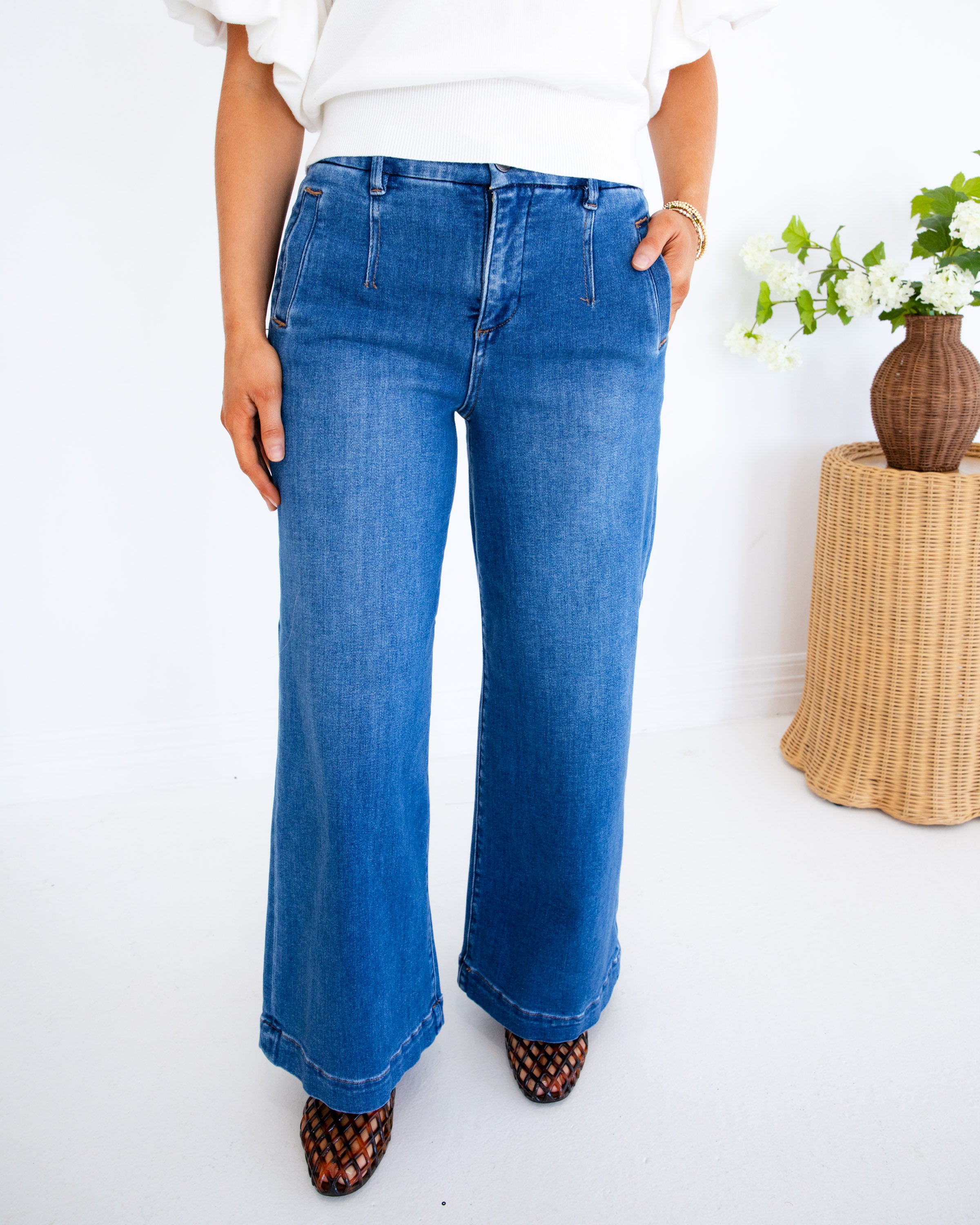 Risen | The Cali Flare Cropped Denim Jeans in Dark