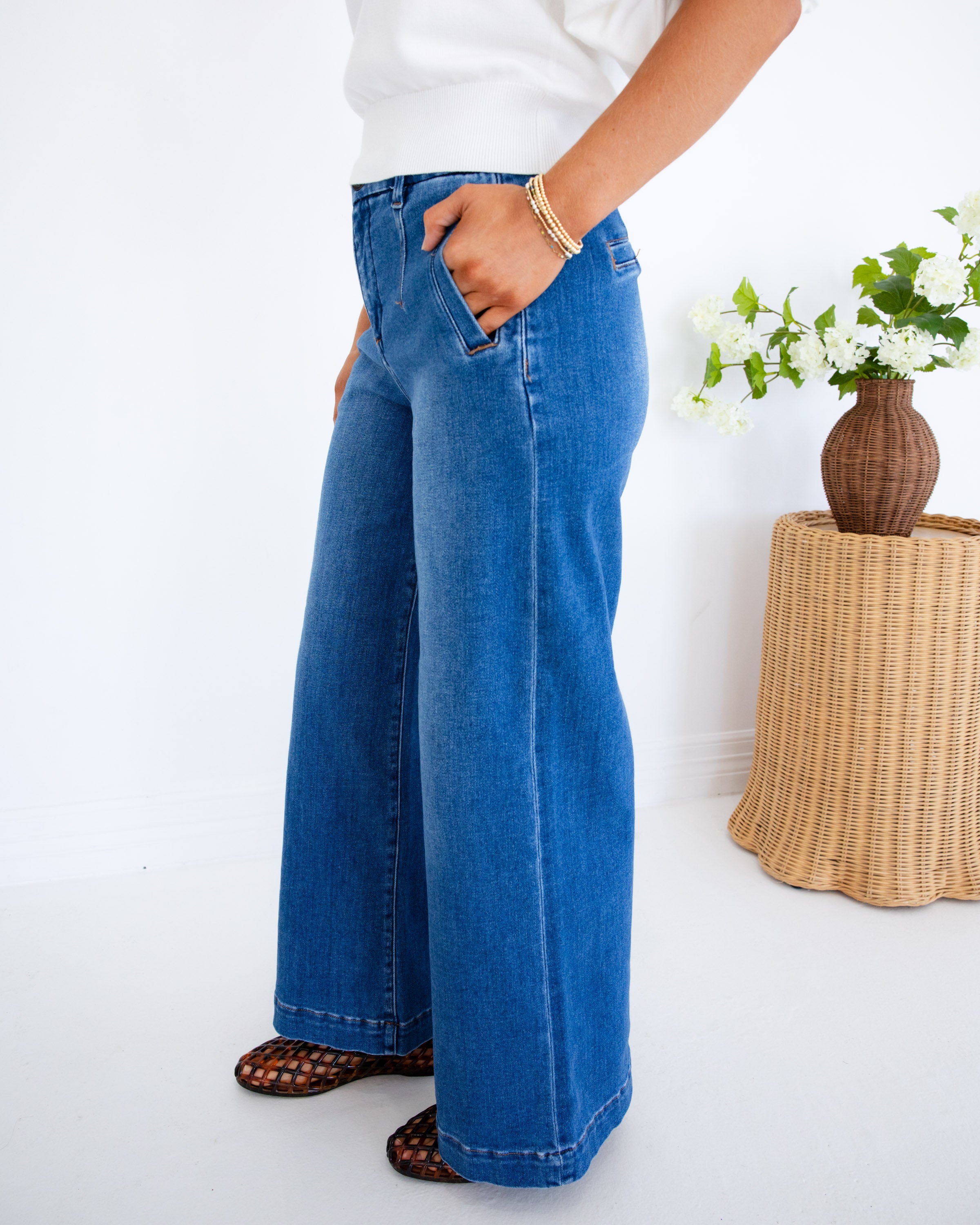 Risen | The Cali Flare Cropped Denim Jeans in Dark