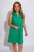 Green sleeveless mini dress with white contrast piping V-neck collar and front patch pockets, women's boutique dress at Gaudie & Co