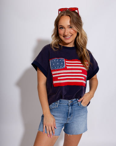 Washed drop shoulder top with frayed American flag patch, women's patriotic casual boutique top at Gaudie & Co