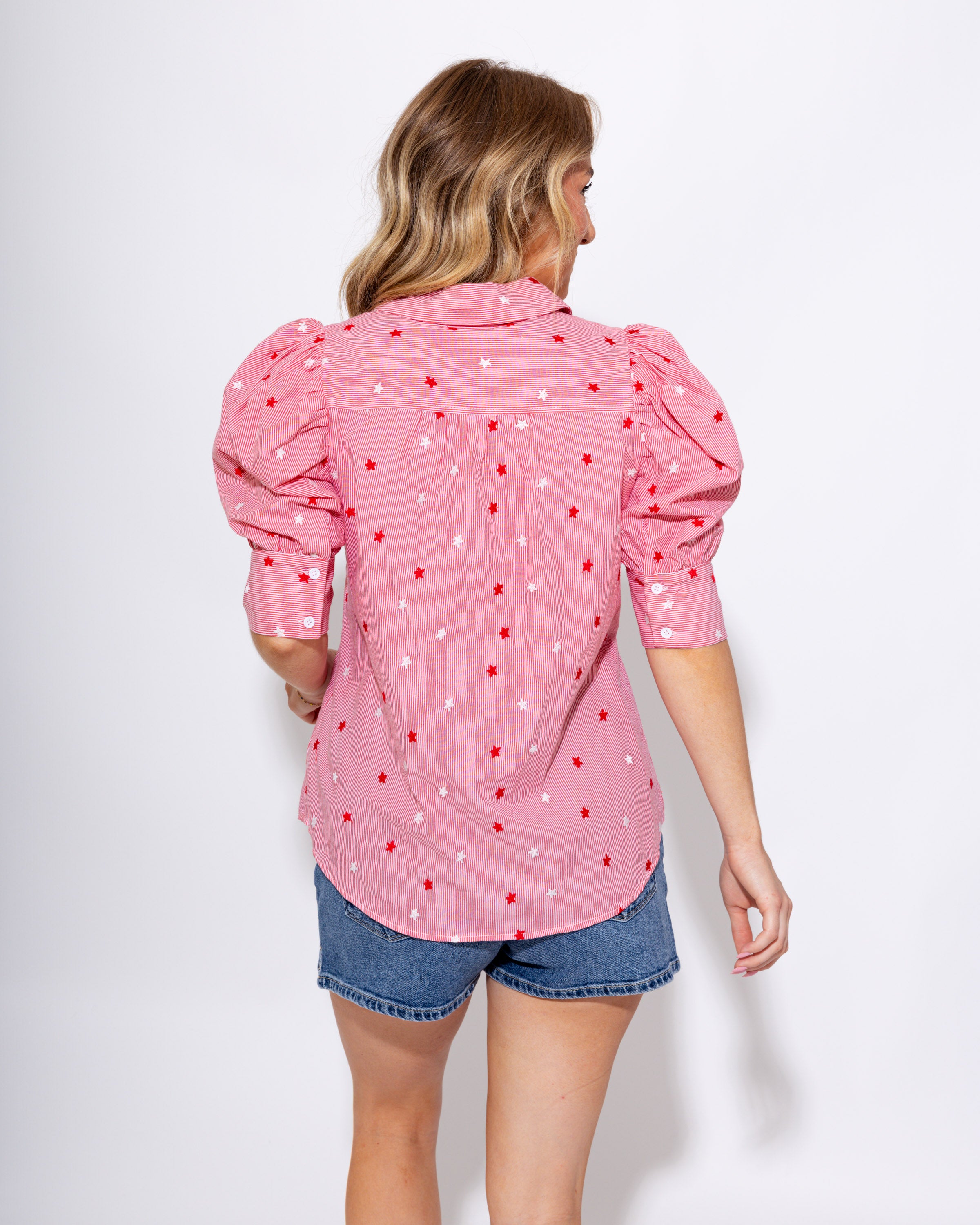 Red striped puff sleeve button-up blouse with star embroidery and ruffle cuffs, women's boutique top at Gaudie & Co