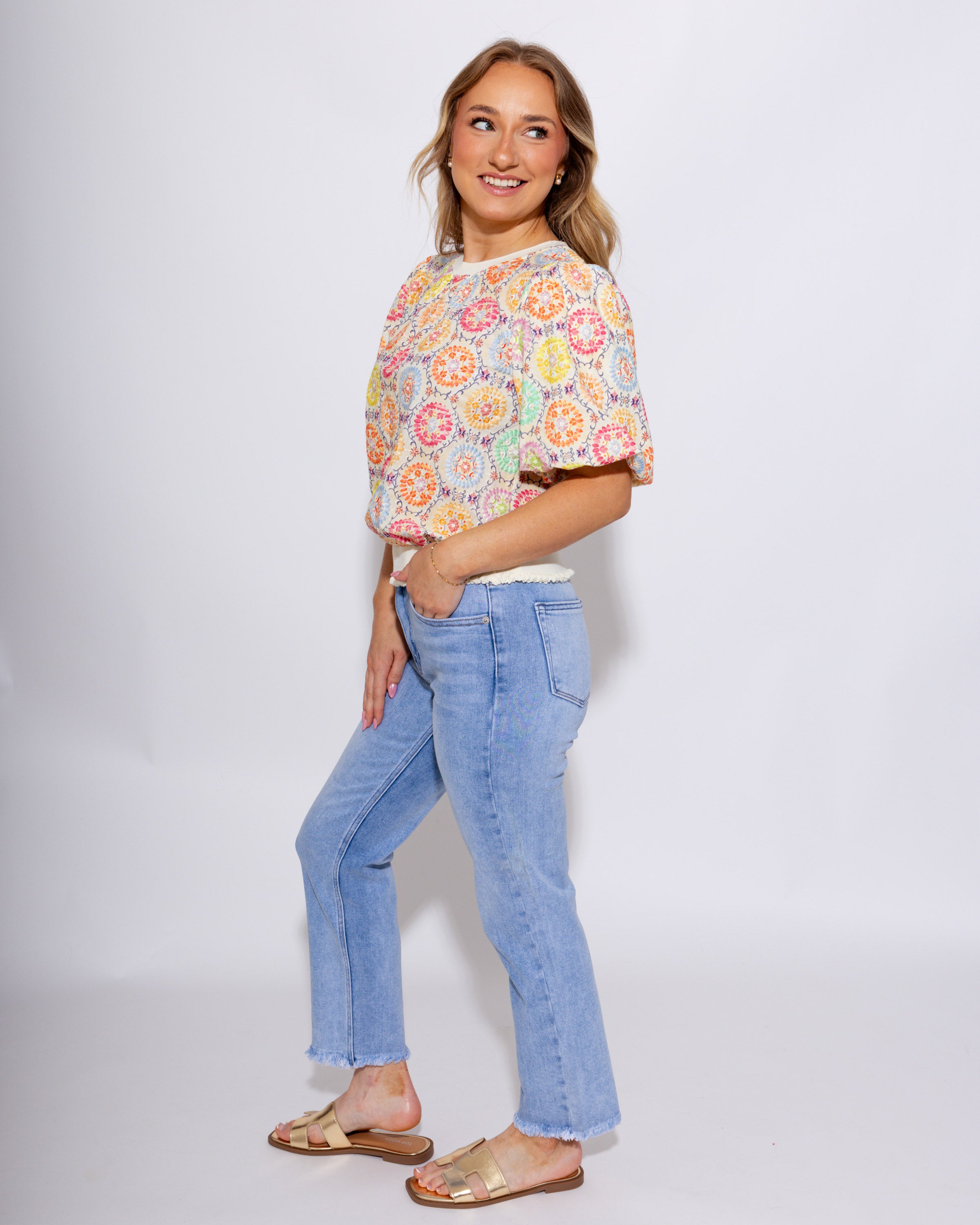 Mid-rise straight leg light wash denim jeans with fray hem detail, women's boutique denim at Gaudie & Co