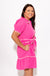 Pink scallop trim babydoll dress styled with sandals, boutique summer outfit at Gaudie & Co
