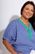 Indigo gingham puff sleeve top side view, lightweight cotton boutique blouse at Gaudie & Co