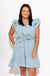 Light denim chambray tie waist mini dress with ruffle V-neckline and pockets, boutique summer dress at Gaudie & Co