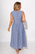 Light blue sleeveless pleated midi dress styled with sandals, summer outfit at Gaudie & Co
