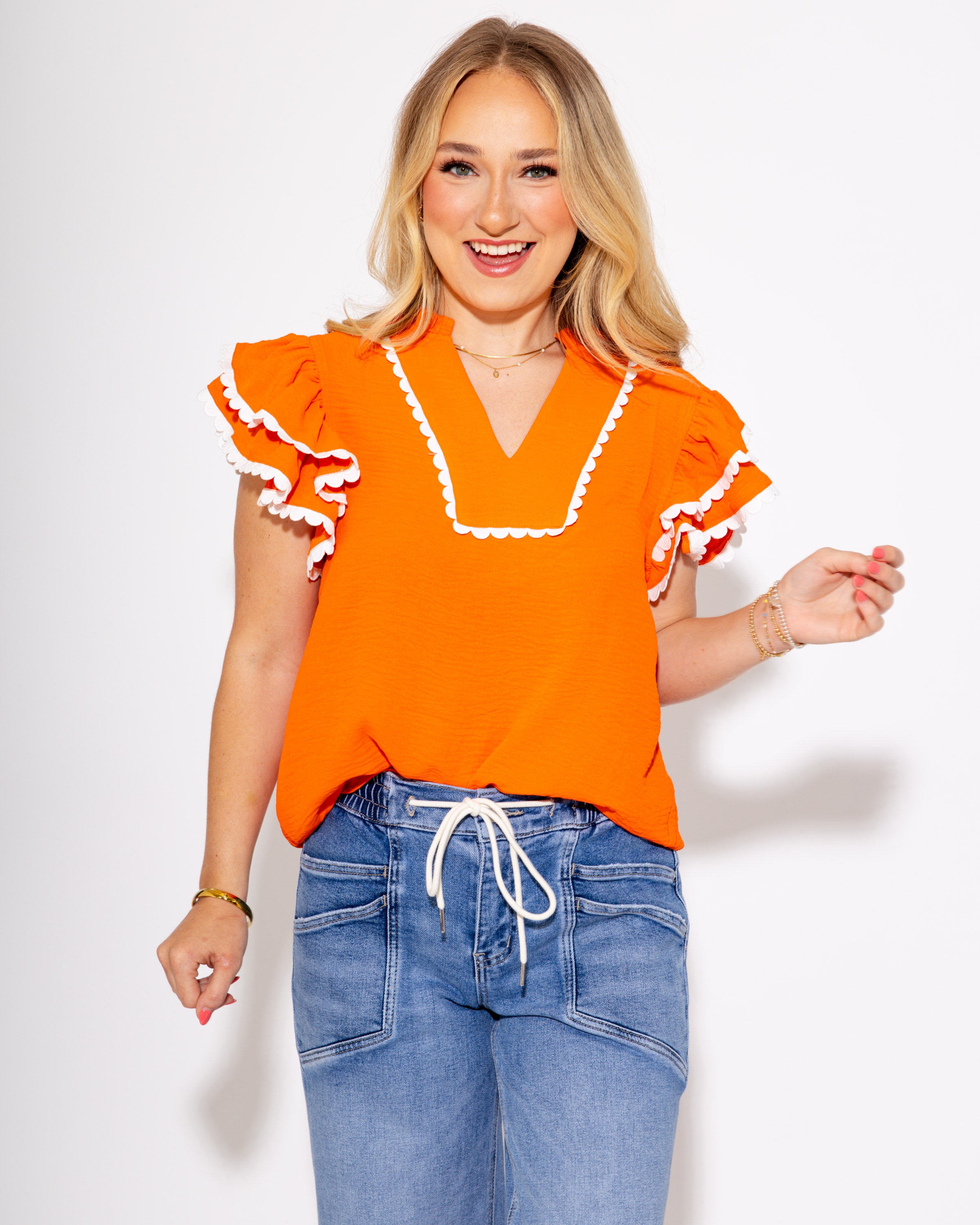 Team Spirit Ruffle Scallop Top in Orange